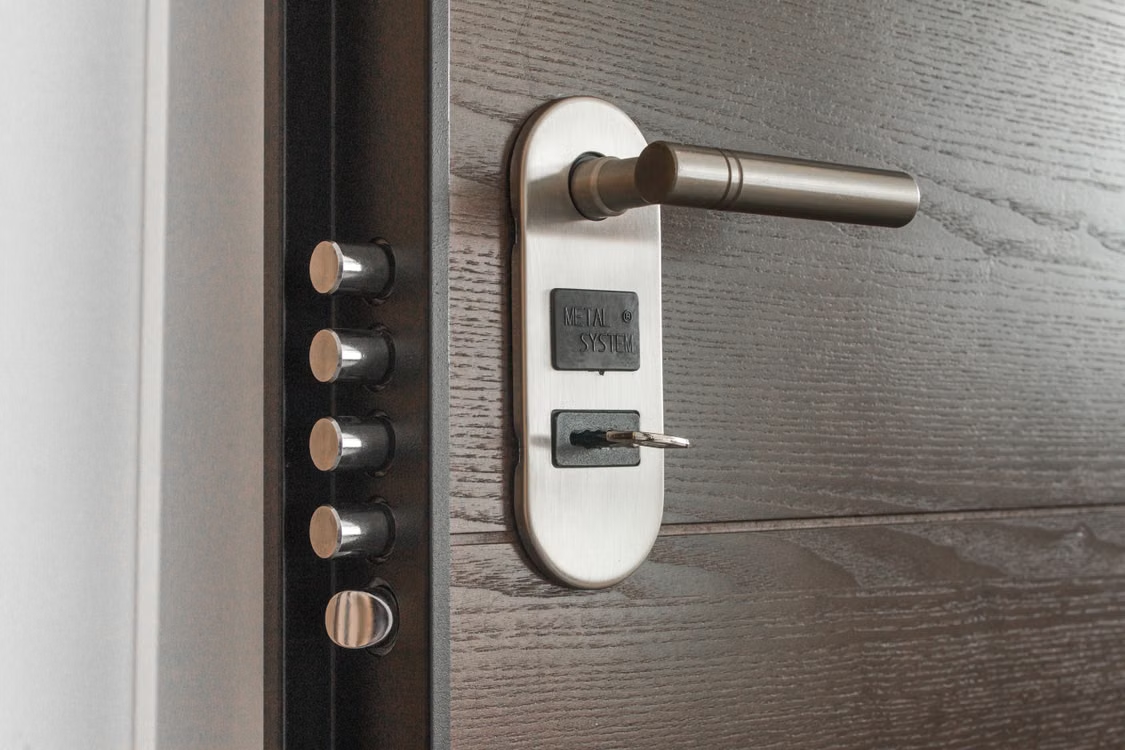 Key in a lock below a handle